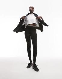 Topshop Tall – Czarne legginsy z elastyczną talią z logo za 39,5 zł w ASOS