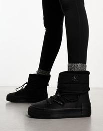 Calvin Klein Jeans – Czarne buty śniegowce na płaskiej wulkanizowanej platformie za 510,3 zł w ASOS