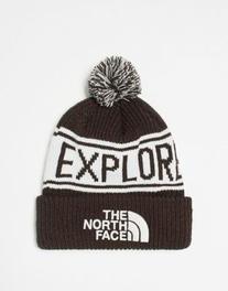 The North Face – Retro – Brązowo-biała czapka z pomponem za 77,4 zł w ASOS