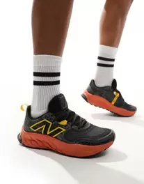 New Balance – Hierro – Czarno-pomarańczowe buty sportowe do biegania w terenie za 849 zł w ASOS