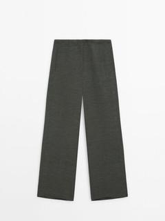 Spodnie z szerokimi nogawkami z lnianej mieszanki za 399 zł w Massimo Dutti