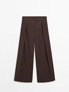 Popelinowe spodnie z szerokimi nogawkami z plisami – Limited Edition za 599 zł w Massimo Dutti