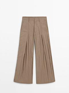 Spodnie z zaszewkami i efektem marszczenia z technicznego materiału – Limited Edition za 599 zł w Massimo Dutti